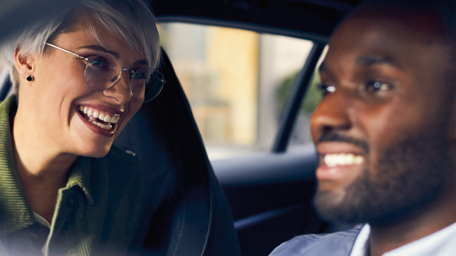 Man and woman talking in a car,Man and woman talking in a car